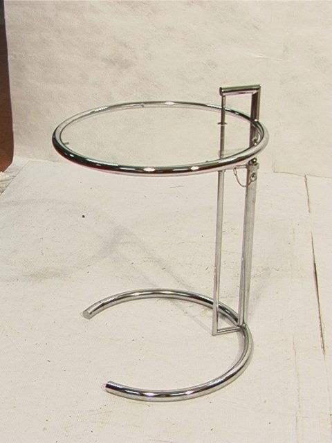 Eileen Gray Chrome and Glass Side Table Adjustabl: Eileen Gray Chrome and Glass Side Table Adjustable Height. Dimensions: H: 28.75 inches: W: 20 inches Condition (General) Please contact us with specific questions about condition, not visible in the p