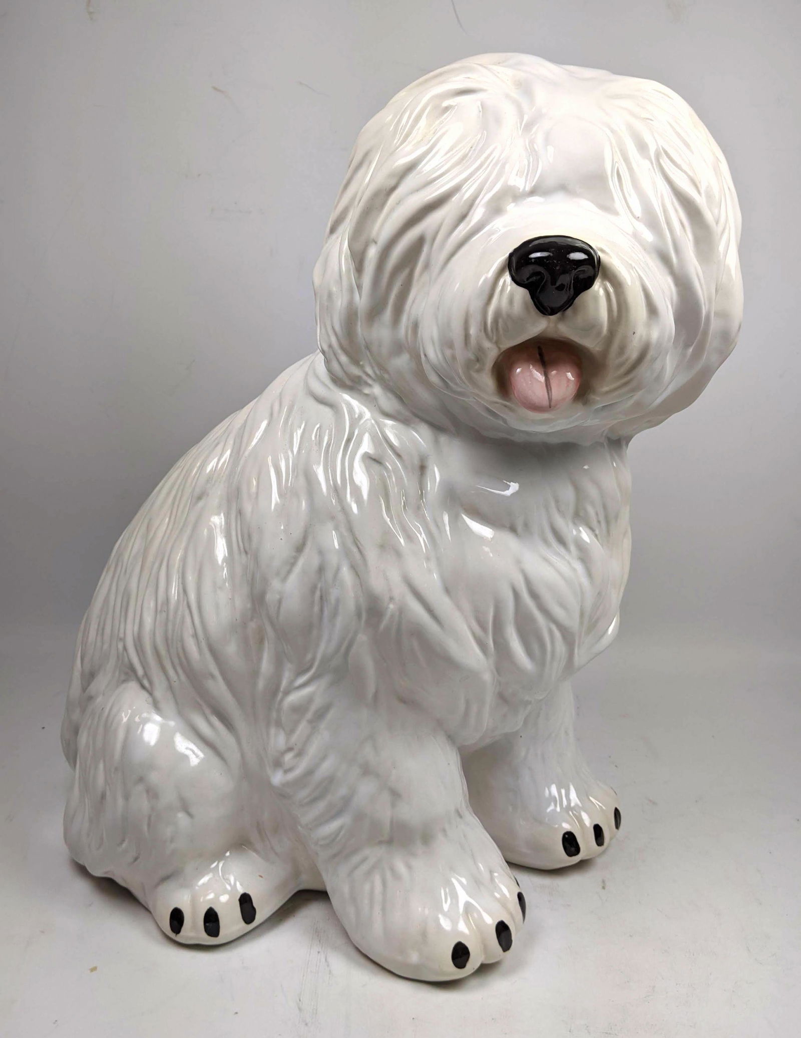 Glazed Pottery Shaggy Dog Sculpture. Signed Howard ???, (1 of 10)