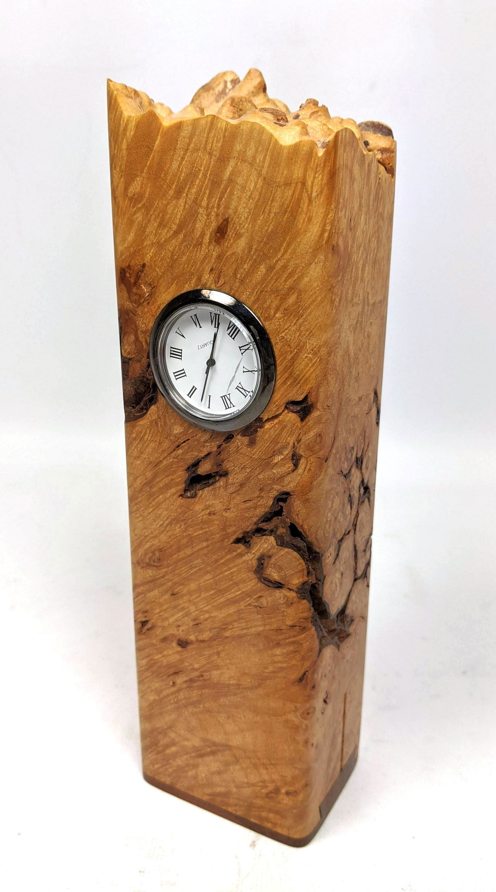 MICHAEL ELKAN Artisan American Woodworker Clock. Burl w: MICHAEL ELKAN Artisan American Woodworker Clock. Burl wood column. Hidden bottom compartment. Signed. -- Dimensions: H: 8.75 inches: W: 2.5 inches: D: 2 inches ---