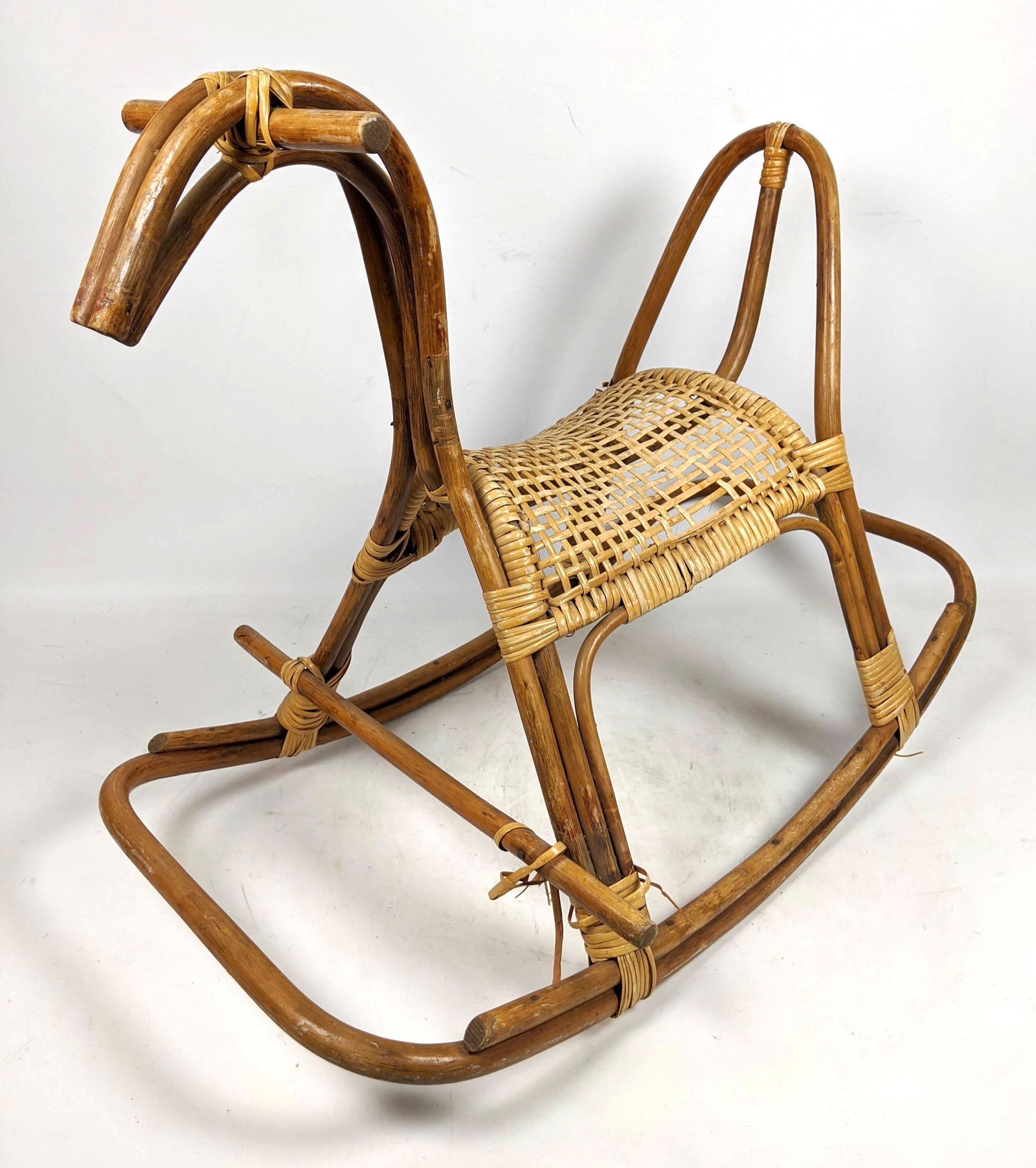 Franco Albini Style Rocking Horse. Woven Rattan.: Franco Albini Style Rocking Horse. Woven Rattan.-- Dimensions: H: 22.5 inches: W: 29 inches: D: 18 inches ---