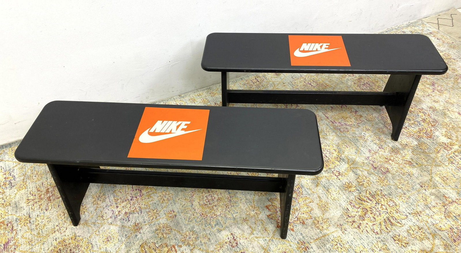 Pair 1980's NIKE Advertising Benches. Black.: Pair 1980's NIKE Advertising Benches. Black. -- Dimensions: H: 20 inches: W: 46.5 inches: D: 14 inches ---