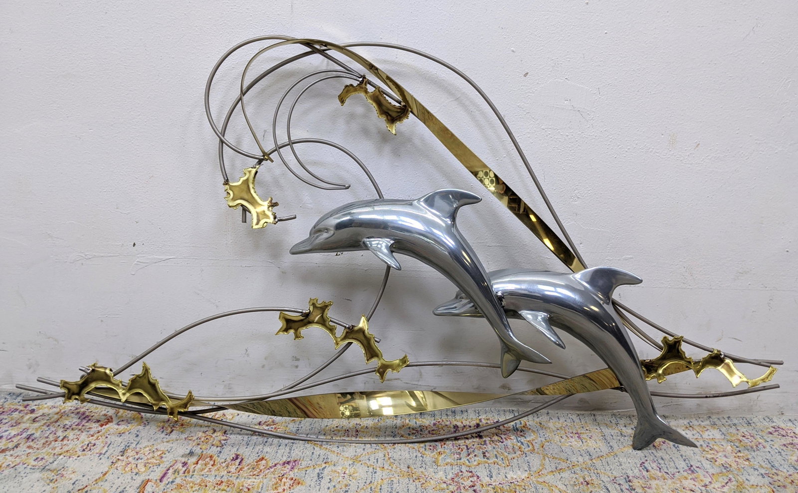 C. JERE Dolphin Wall Sculpture. Mixed Metal. 1991: C. JERE Dolphin Wall Sculpture. Mixed Metal. 1991-- Dimensions: H: 25 inches: W: 47 inches: D: 6 inches ---