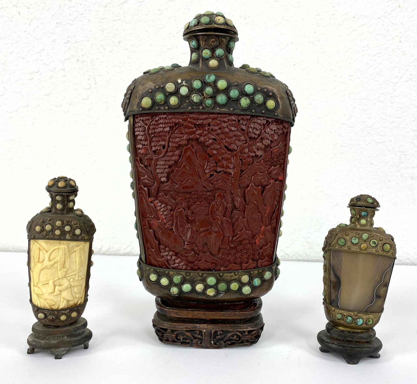 3 Antique Tibetan/Mongolian Snuff Bottles with Carved C: 3 Antique Tibetan/Mongolian Snuff Bottles with Carved Cinnabar and Bone reliefs and Agate. -- Dimensions: H: 10 inches: W: 5.5 inches: D: 2 inches ---