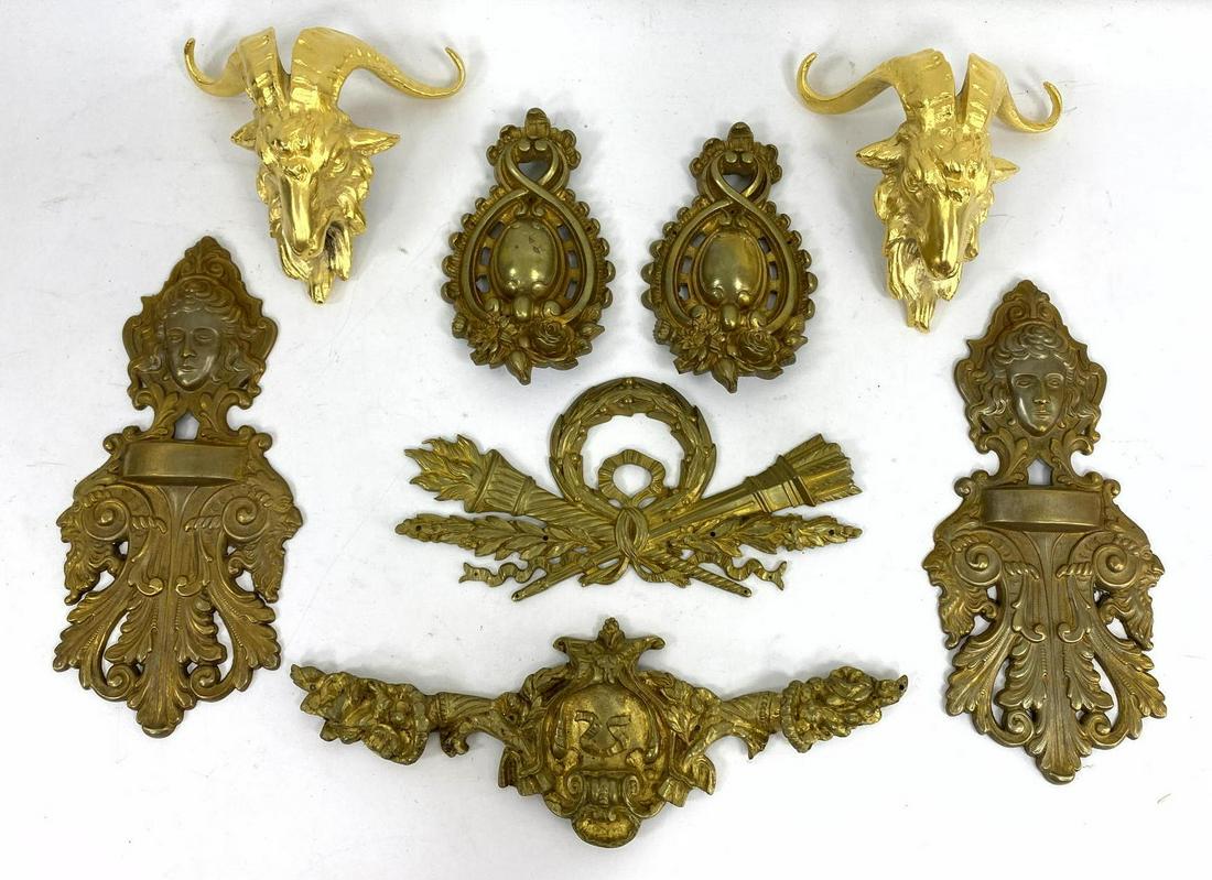 8pc Brass and Bronze Ormolu Mounts. Furniture decoratio: 8pc Brass and Bronze Ormolu Mounts. Furniture decorations. Rams heads. arrow and quiver, etc. -- Dimensions: H: 10.5 inches: W: 5.25 inches ---