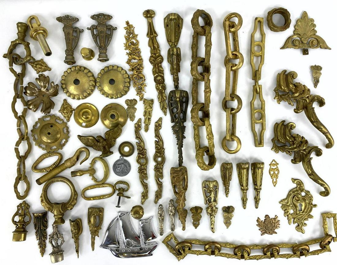 Large Lot of Brass and Bronze Accessories. Chain and fu: Large Lot of Brass and Bronze Accessories. Chain and furniture mounts. -- Dimensions: H: 4 inches: W: 10.5 inches: D: 7 inches ---