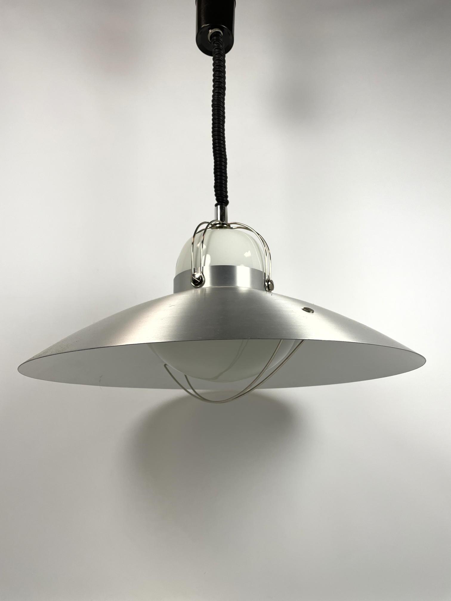 ROLLY 1973 Stainless Steel Hanging Pendant Light. Black: ROLLY 1973 Stainless Steel Hanging Pendant Light. Black twisted Cord. Adjustable Height. Made in Italy. -- Dimensions: H: 28 inches: W: 21.5 inches: D: 21.5 inches ---