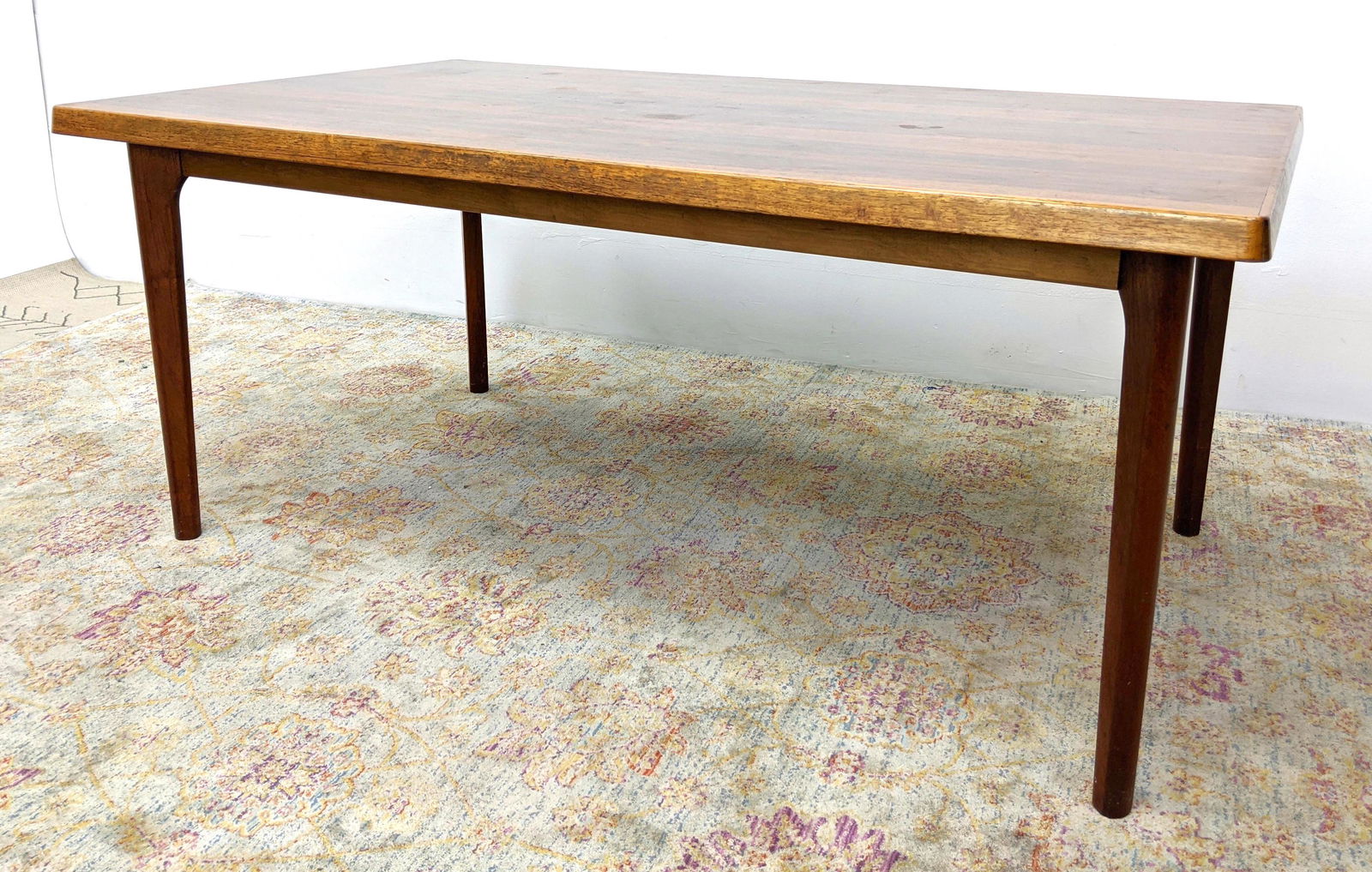 Rosewood Modernist Dining Table. Clean simple tapered l: Rosewood Modernist Dining Table. Clean simple tapered legs. -- Dimensions: H: 28 inches: W: 64.5 inches: D: 37 inches ---