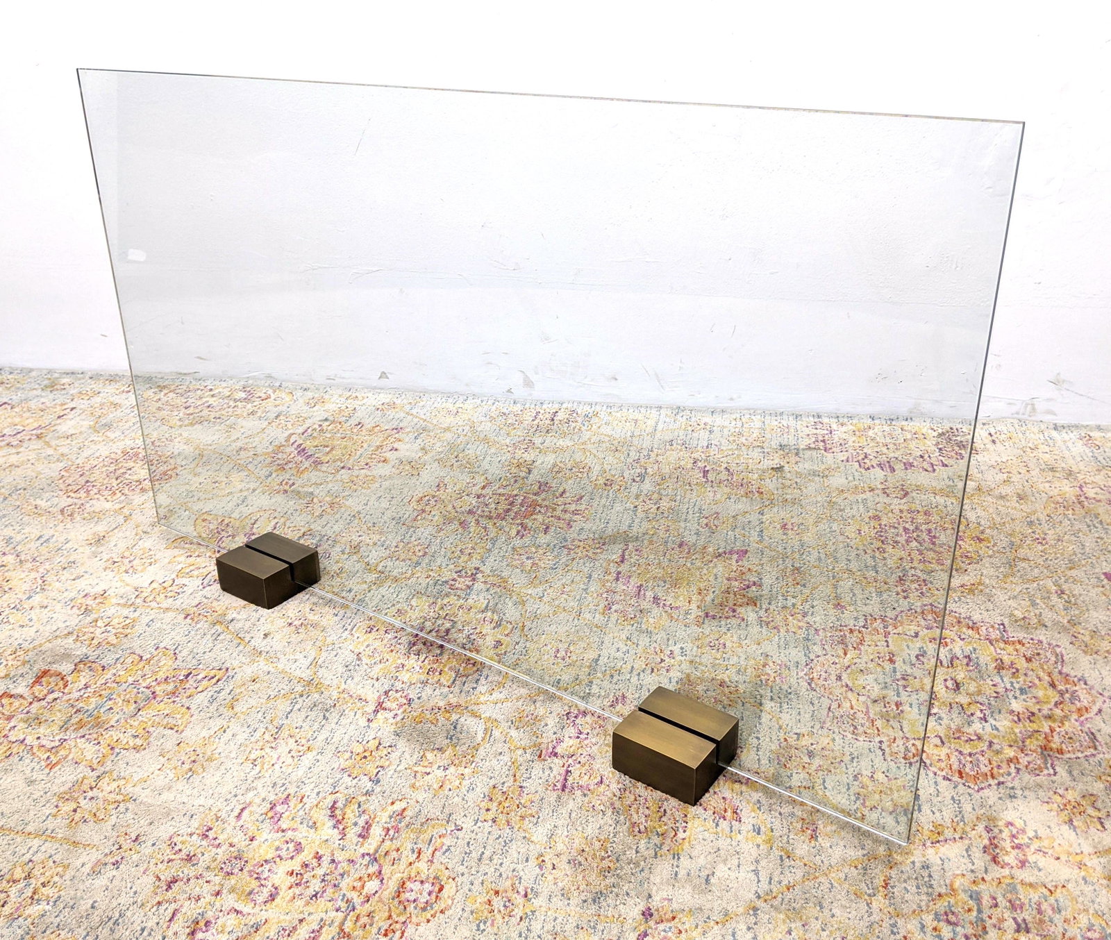 Glass And Brass Modernist Fireplace Screen. Minimalist: Glass And Brass Modernist Fireplace Screen. Minimalist style. Marked STONE MFG; USA-- Dimensions: H: 26.5 inches: W: 45 inches ---