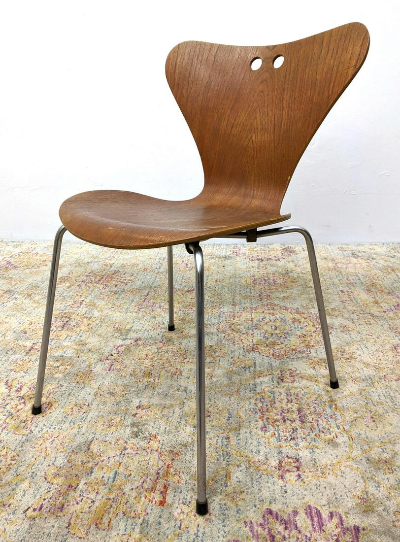 Fritz Hansen Arne Jacobsen Molded Wood Chair. Unusual: Fritz Hansen Arne Jacobsen Molded Wood Chair. Unusual with cut out circles.-- Dimensions: H: 30 inches: W: 18 inches: D: 22 inches ---