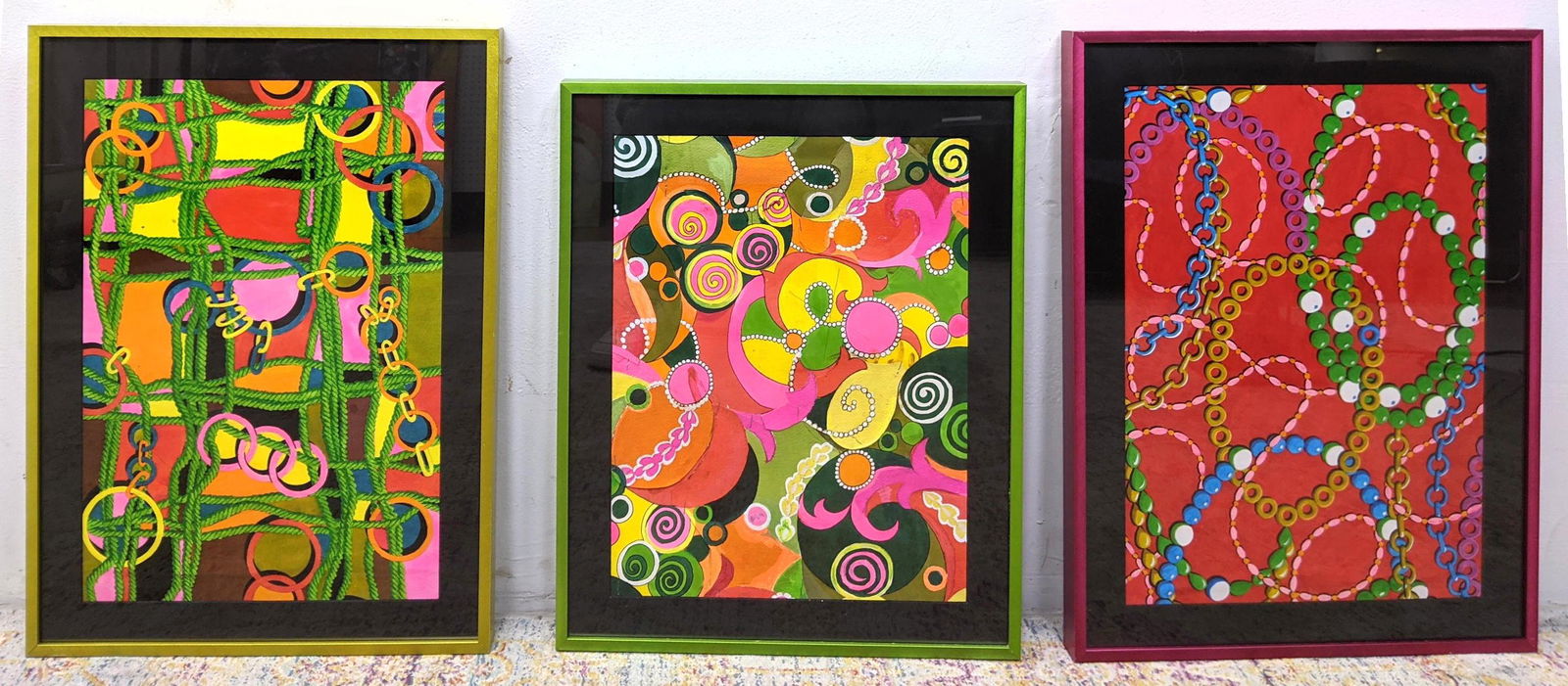 3pc Day Glo Art Paintings. One is a collage with swirls: 3pc Day Glo Art Paintings. One is a collage with swirls, "pearls" and abstract images Glued and stapled in layers. One One painting of green woven cord and links. One of circle links and bead design.
