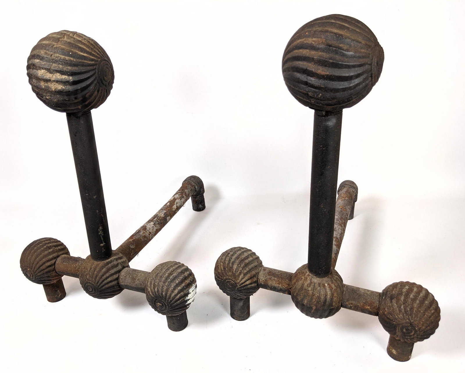 Modernist Steampunk Iron Firedogs Andirons. Ball detail: Modernist Steampunk Iron Firedogs Andirons. Ball details with twisted ribbed pattern. -- Dimensions: H: 18.5 inches: W: 18 inches: D: 13 inches ---