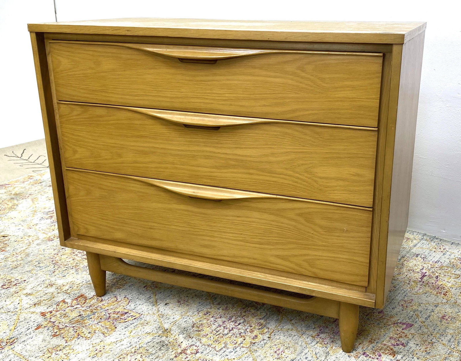 Modernist Blond Wood Bachelor's Chest Dresser. Raised o: Modernist Blond Wood Bachelor's Chest Dresser. Raised on legs. Stylish wood pulls-- Dimensions: H: 31 inches: W: 36.5 inches: D: 19 inches ---