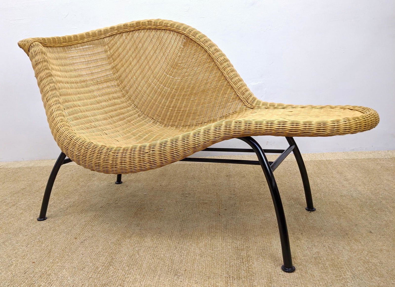 Woven Wicker Chaise Lounge. Modern style seating on bla (1 of 12)