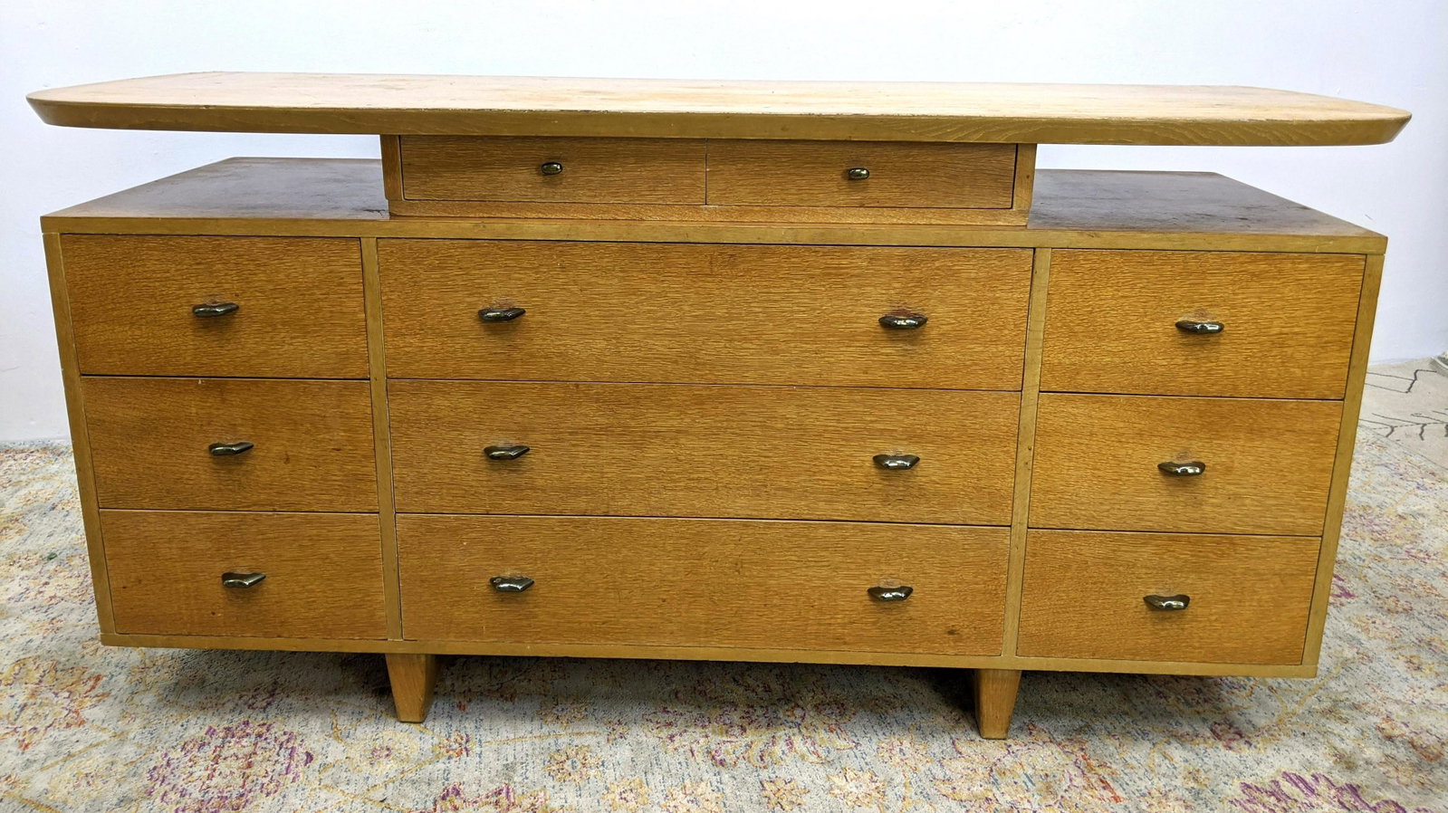 Blond Wood Credenza with Floating Top detail. Dresser C: Blond Wood Credenza with Floating Top detail. Dresser Chest of Drawers raised on legs. Top section is separate and lifts off-- Dimensions: H: 33 inches: W: 67 inches: D: 23 inches ---