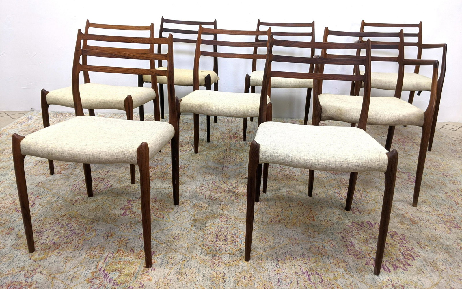 Set 8 Rosewood MOLLER Denmark Danish Modern Dining Chai: Set 8 Rosewood MOLLER Denmark Danish Modern Dining Chairs. Two Arms; Six Side Chairs (These chairs were sold by us in an earlier 2021 auction, however the UK based bidder failed to pay)-- Dimensions: 