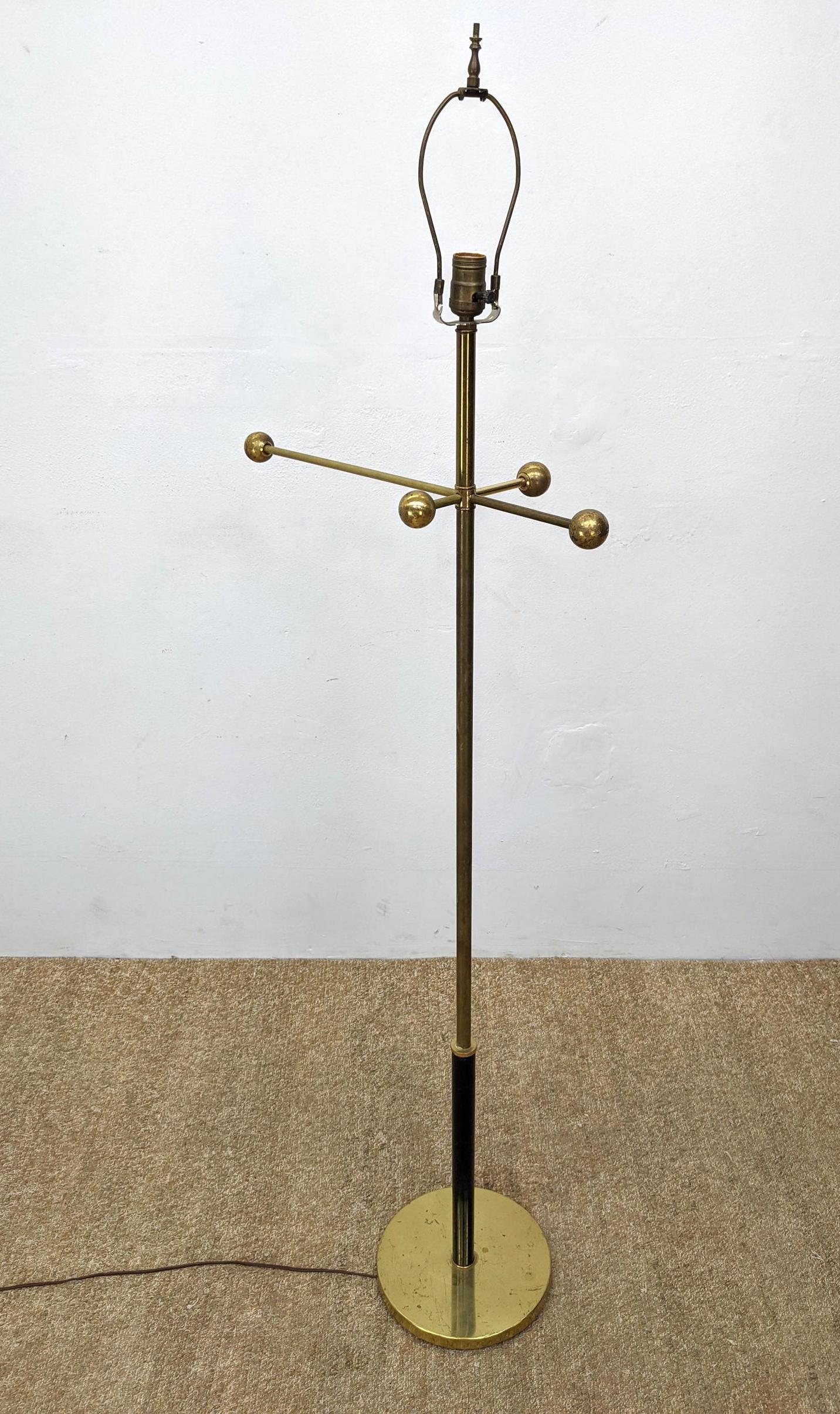 Minimalist Sculptural Brass Floor Lamp. Bisecting rods: Minimalist Sculptural Brass Floor Lamp. Bisecting rods with ball tips-- Dimensions: H: 63 inches: W: 22.5 inches: D: 10.5 inches ---