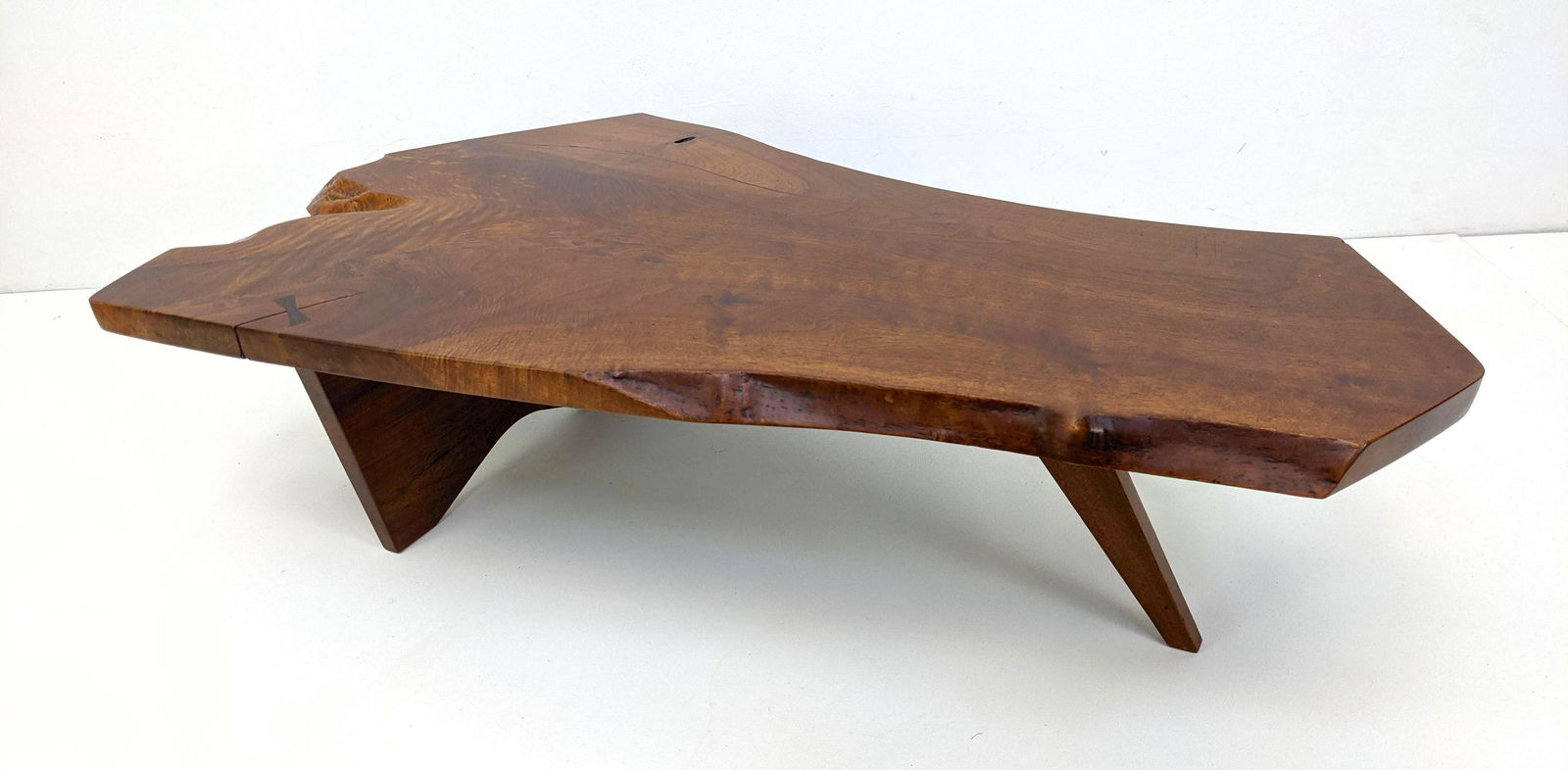 GEORGE NAKASHIMA English Walnut Slab Coffee Table w ltr: GEORGE NAKASHIMA ENGLISH WALNUT COFFEE TABLE. Single Slab Top. One Butterfly Joint. Beautiful Grain. This item includes a Letter of Authentication from the Nakashima studios, signed by Mira Nakashima.