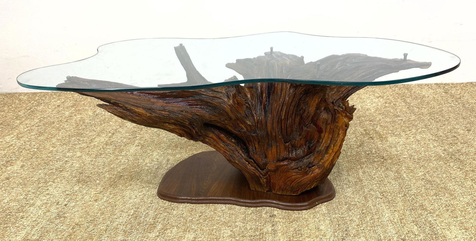 Ponderosa Pine Tree Stump Base Coffee Table. Elegant Na: Ponderosa Pine Tree Stump Base Coffee Table. Elegant Natural Wood Base supports Glass Top. Signed S. DAK????? '78-- Dimensions: H: 17.25 inches: W: 45 inches: D: 23 inches ---