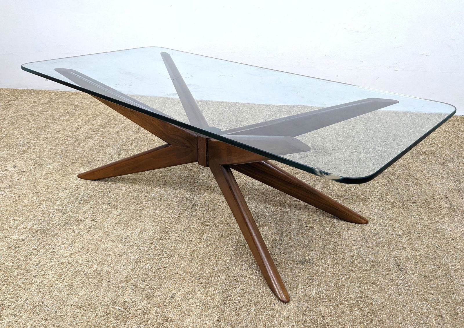 Adrian Pearsall Style Walnut Base Cocktail Table. Glass: Adrian Pearsall Style Walnut Base Cocktail Table. Glass Top Coffee Table. -- Dimensions: H: 15.5 inches: W: 48 inches: D: 23 inches ---