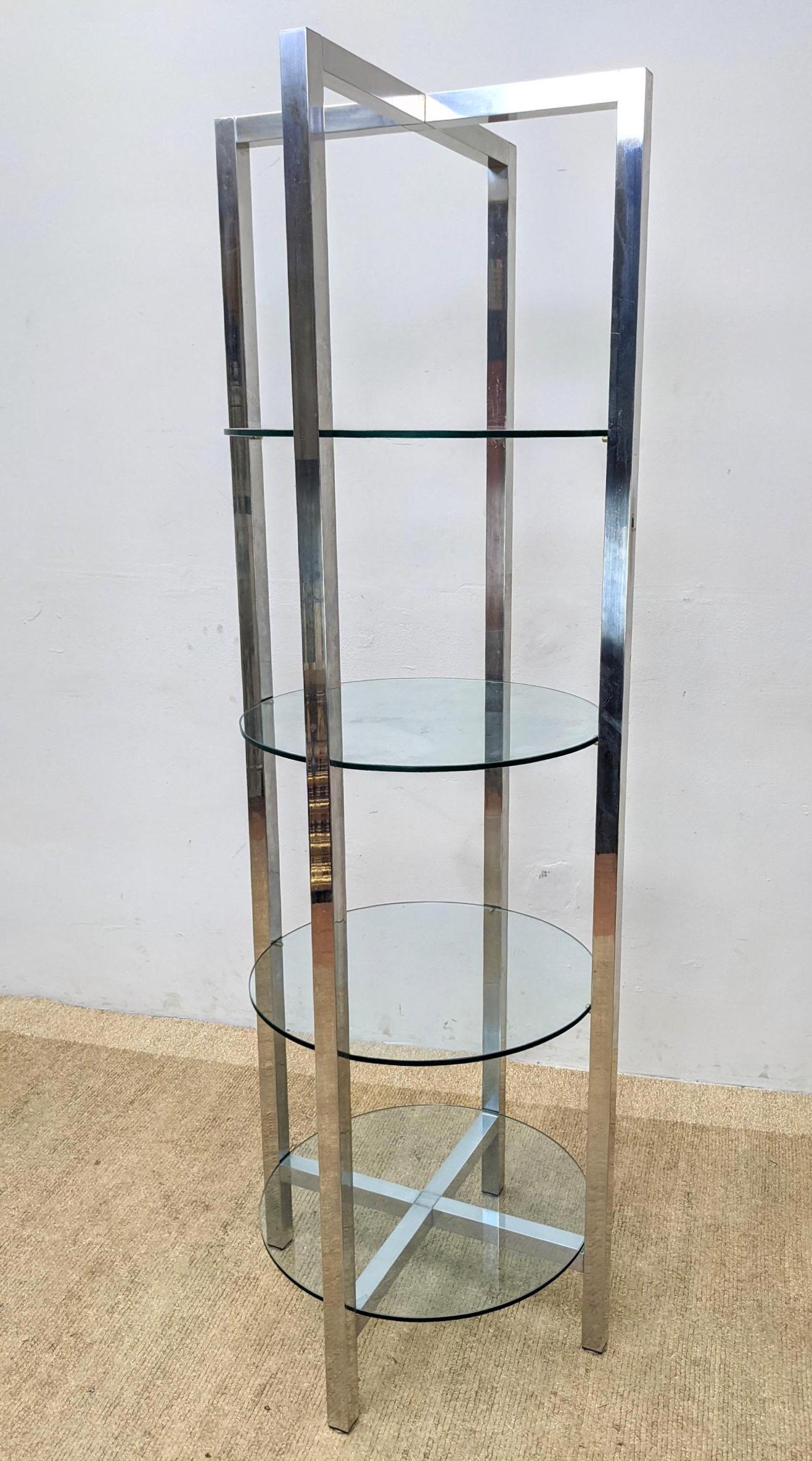 Milo Baughman style Chrome Glass Column Etagere. Modern: Milo Baughman style Chrome Glass Column Etagere. Modernist Chrome column Frame with round glass shelves. -- Dimensions: H: 80 inches: W: 27 inches: D: 27 inches ---