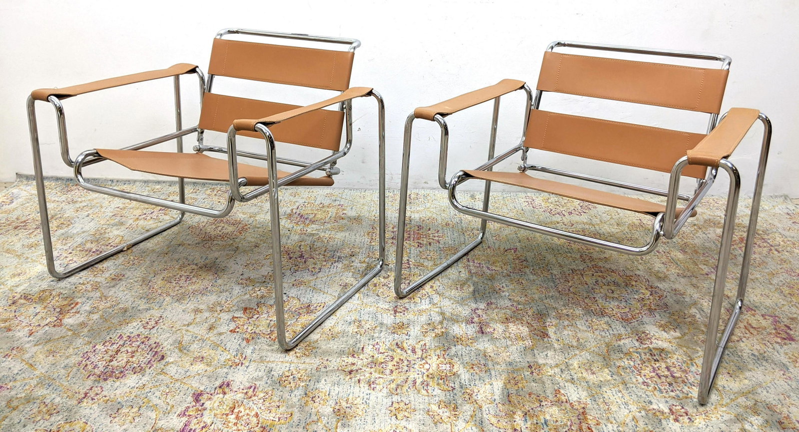 Pair Italian Marcel Breuer Style Wassily Lounge Chairs.: Pair Italian Marcel Breuer Style Wassily Lounge Chairs. Leather and chrome.-- Dimensions: H: 28 inches: W: 31 inches: D: 28 inches ---