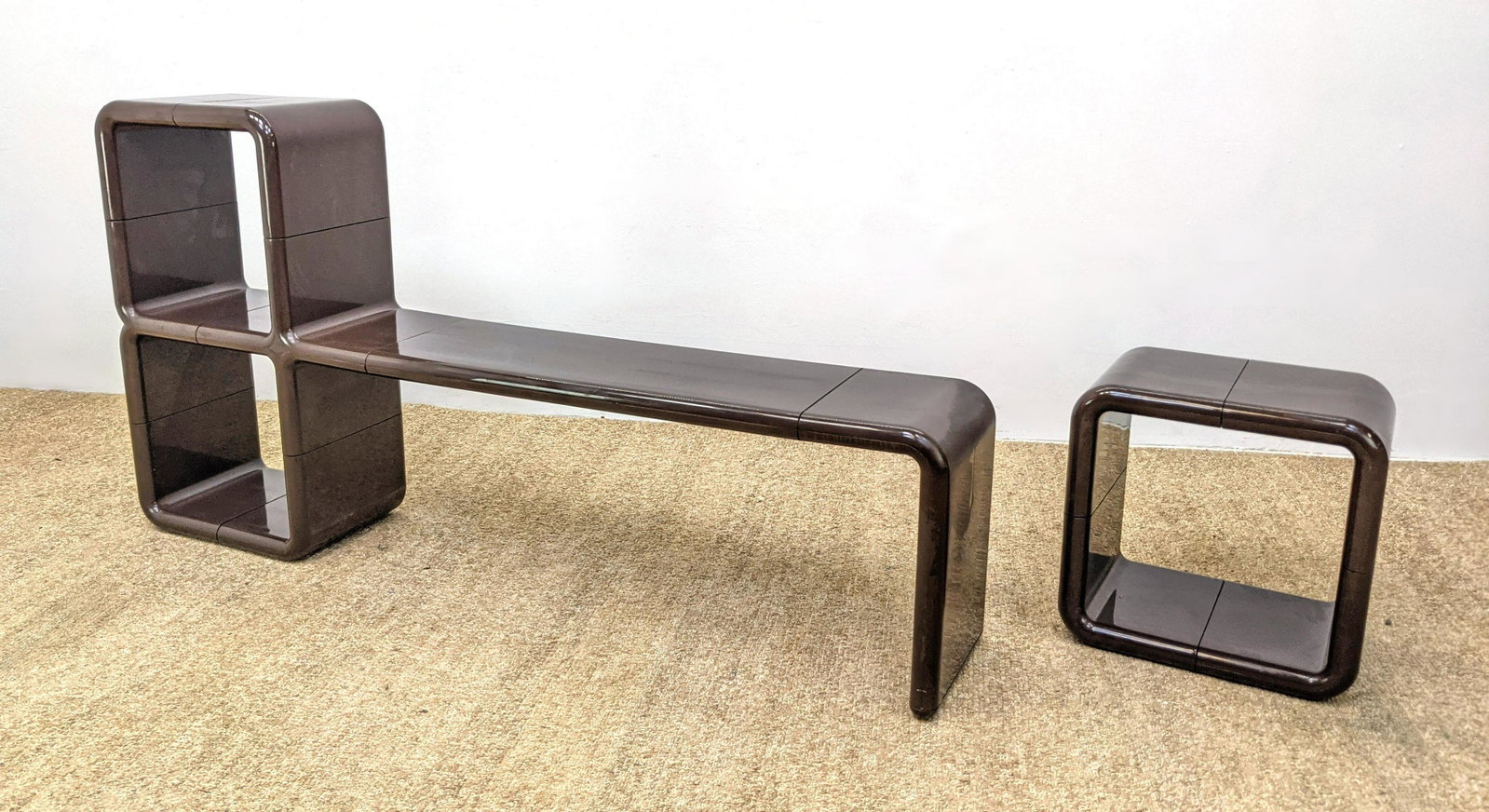 Modernist UMBO Modular Molded Plastic Storage Unit. Boo: Modernist UMBO Modular Molded Plastic Storage Unit. Bookcase Display Stand. Brown. -- Dimensions: H: 34 inches: W: 64 inches: D: 12 inches ---