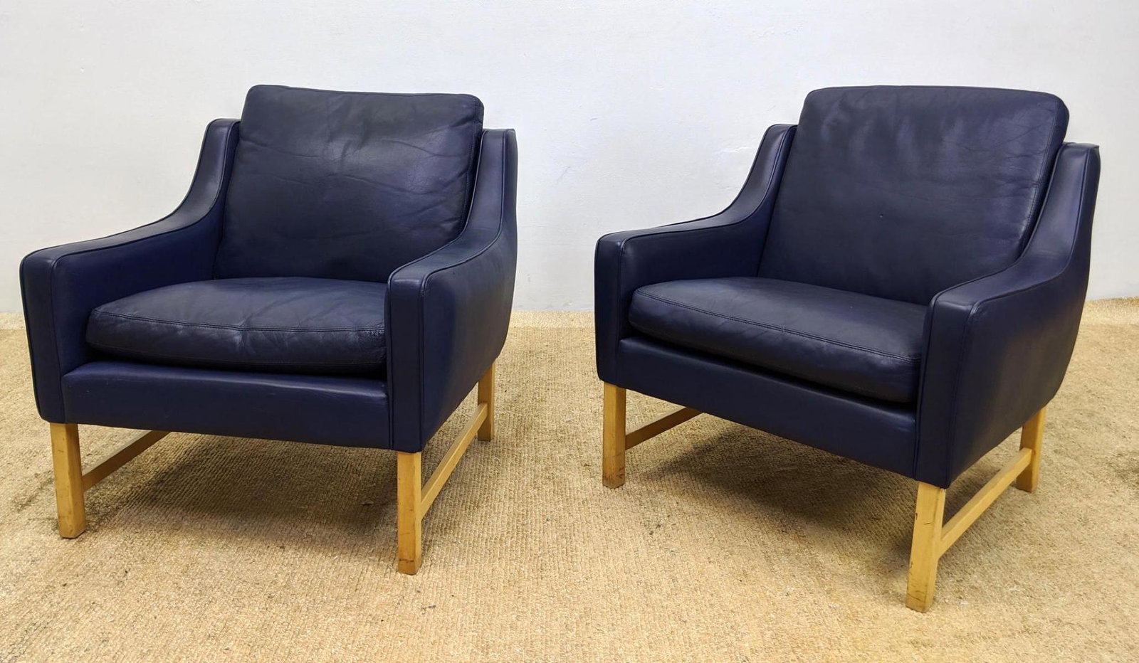 Pr VATNE MOBLER Blue Leather Modernist Lounge Chairs.: Pr VATNE MOBLER Blue Leather Modernist Lounge Chairs. Sloped Arms. Square Blond Wood Frames.-- Dimensions: H: 29 inches: W: 28 inches: D: 29 inches ---