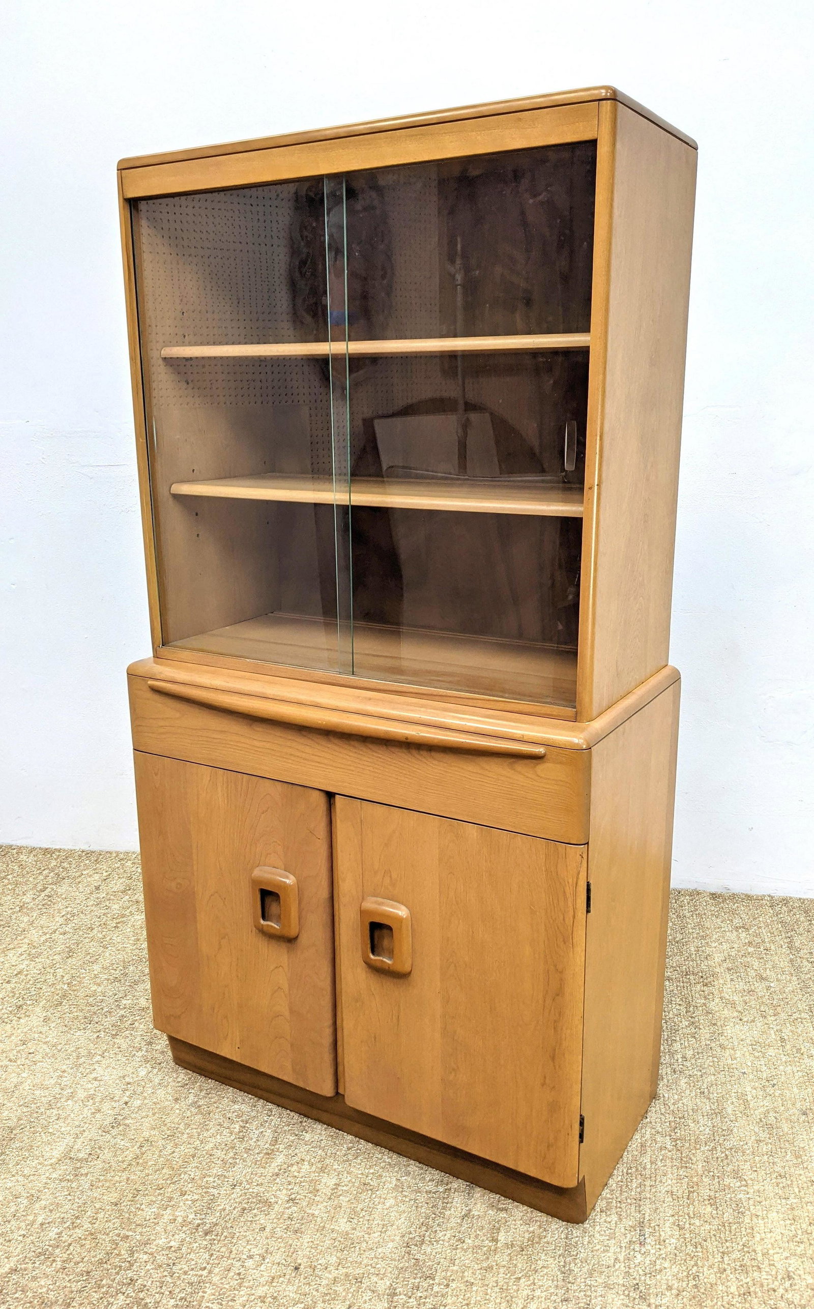 HEYWOOD WAKEFIELD Modernist China Cabinet. Sliding Gla: HEYWOOD WAKEFIELD Modernist China Cabinet. Sliding Glass Doors. Champagne finish. -- Dimensions: H: 65 inches: W: 34 inches: D: 18 inches ---