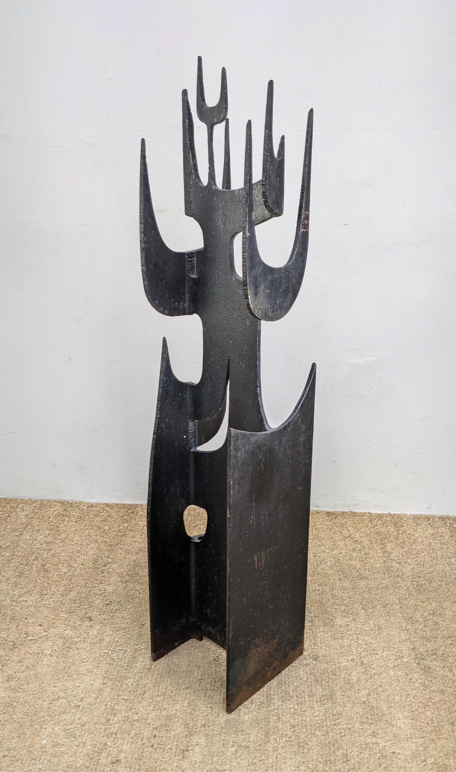 4' Tall Welded and Cut Steel Sculpture. Designed from i: 4' Tall Welded and Cut Steel Sculpture. Designed from industrial I beam. Great modernist style. Very heavy.-- Dimensions: H: 50 inches: W: 10 inches: D: 10 inches ---