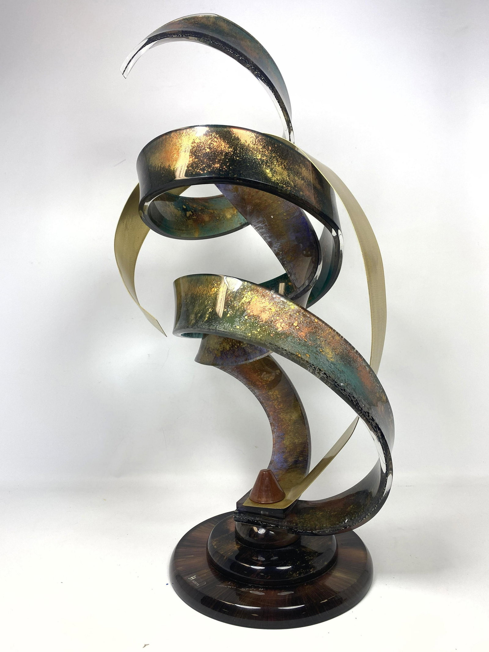 SHLOMI HAZIZA Lucite Metal Ribbon Modern Sculpture. Tor: SHLOMI HAZIZA Lucite Metal Ribbon Modern Sculpture. Tortoise colored lucite, metal bands in organic form. Engraved signature; dated 99. Label. -- Dimensions: H: 34 inches: W: 12 inches: D: 12 inches -
