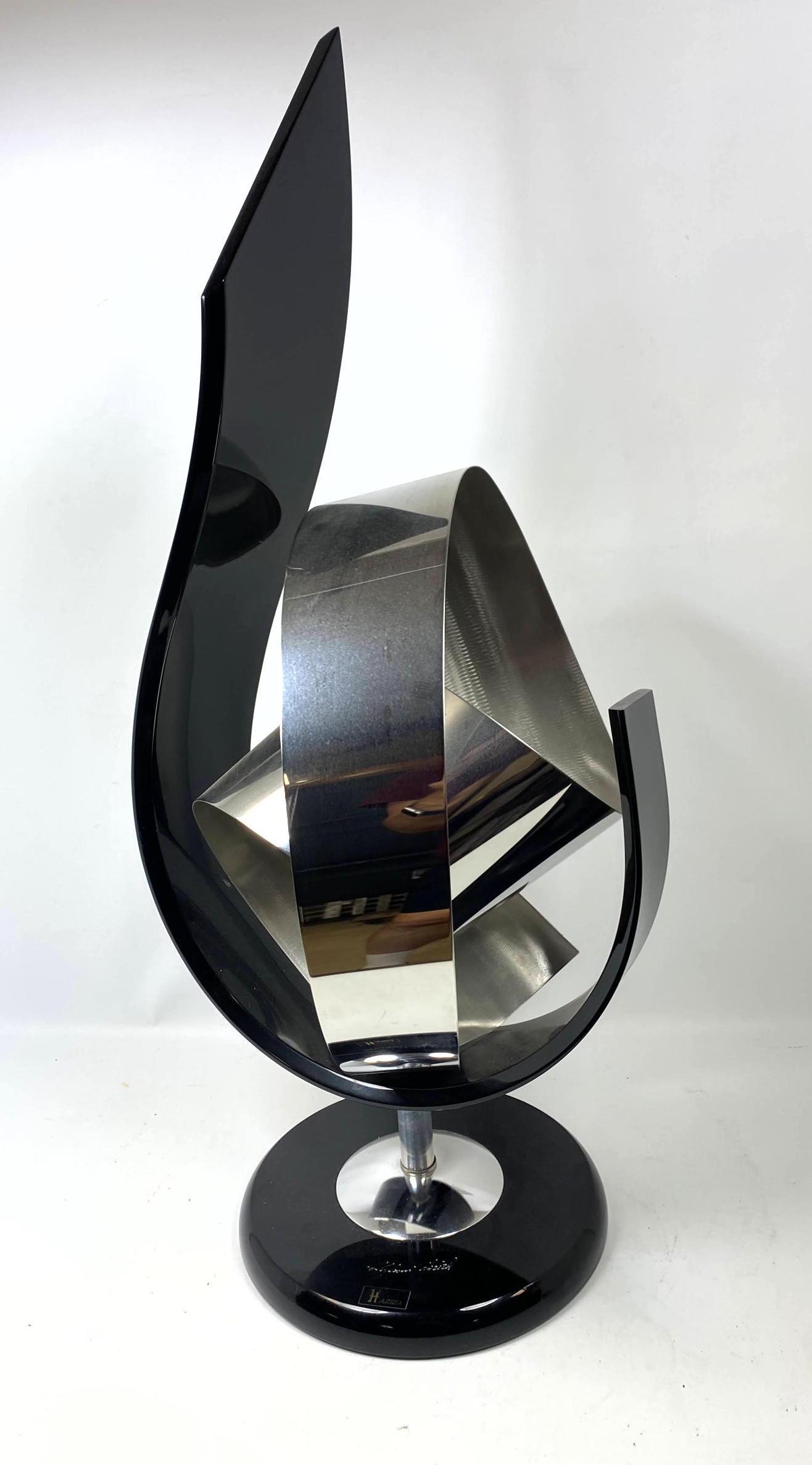 SHLOMI HAZIZA Lucite Metal Ribbon Modern Sculpture. Bla: SHLOMI HAZIZA Lucite Metal Ribbon Modern Sculpture. Black lucite, silver metal bands in organic form. Engraved signature. Label. -- Dimensions: H: 35 inches: W: 14 inches: D: 14 inches ---