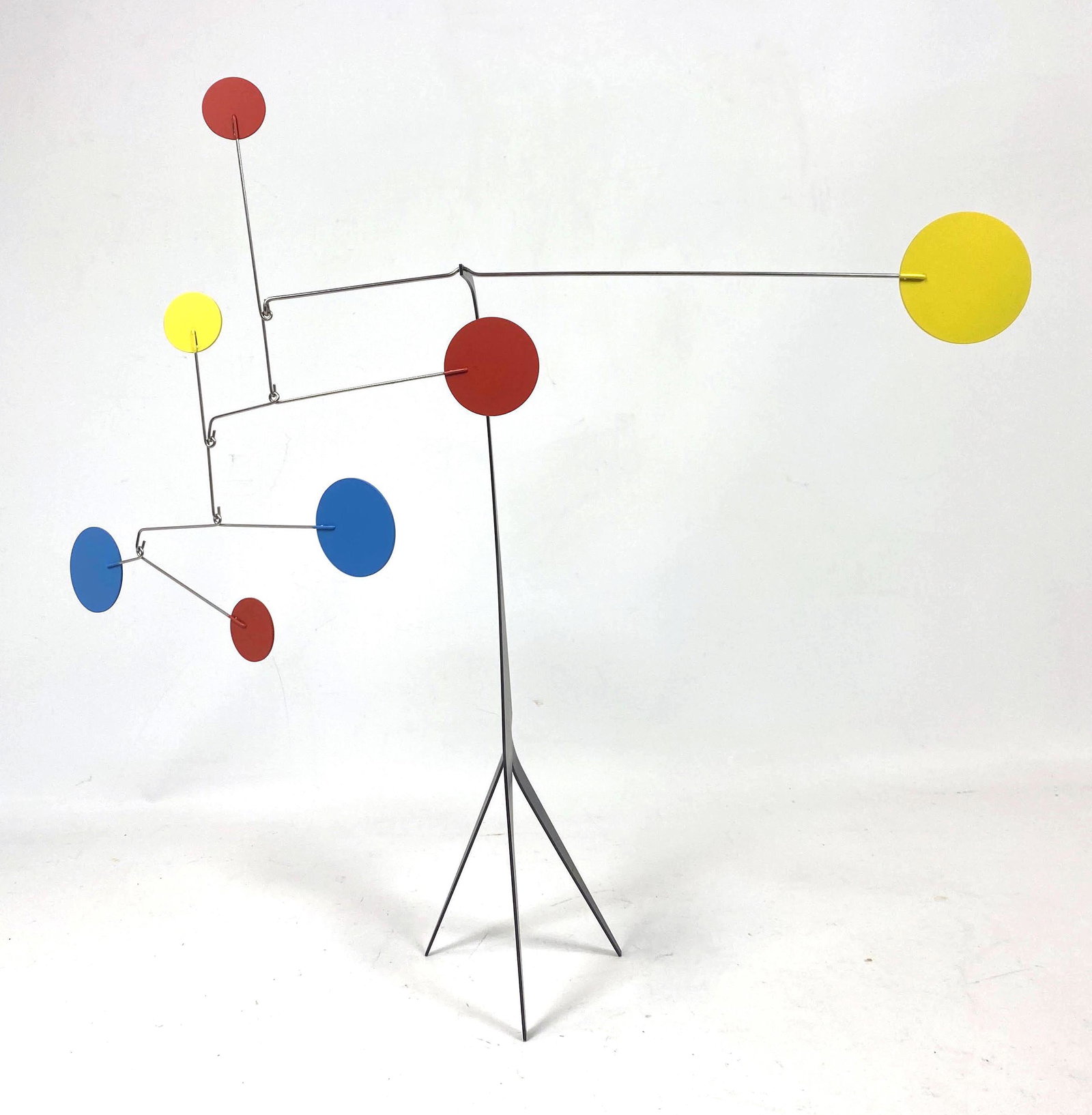Calderesque Primary Color Stabile Mobile. Black base fo: Calderesque Primary Color Stabile Mobile. Black base form with round paddles. -- Dimensions: H: 18.75 inches: W: 20 inches: D: 5 inches ---