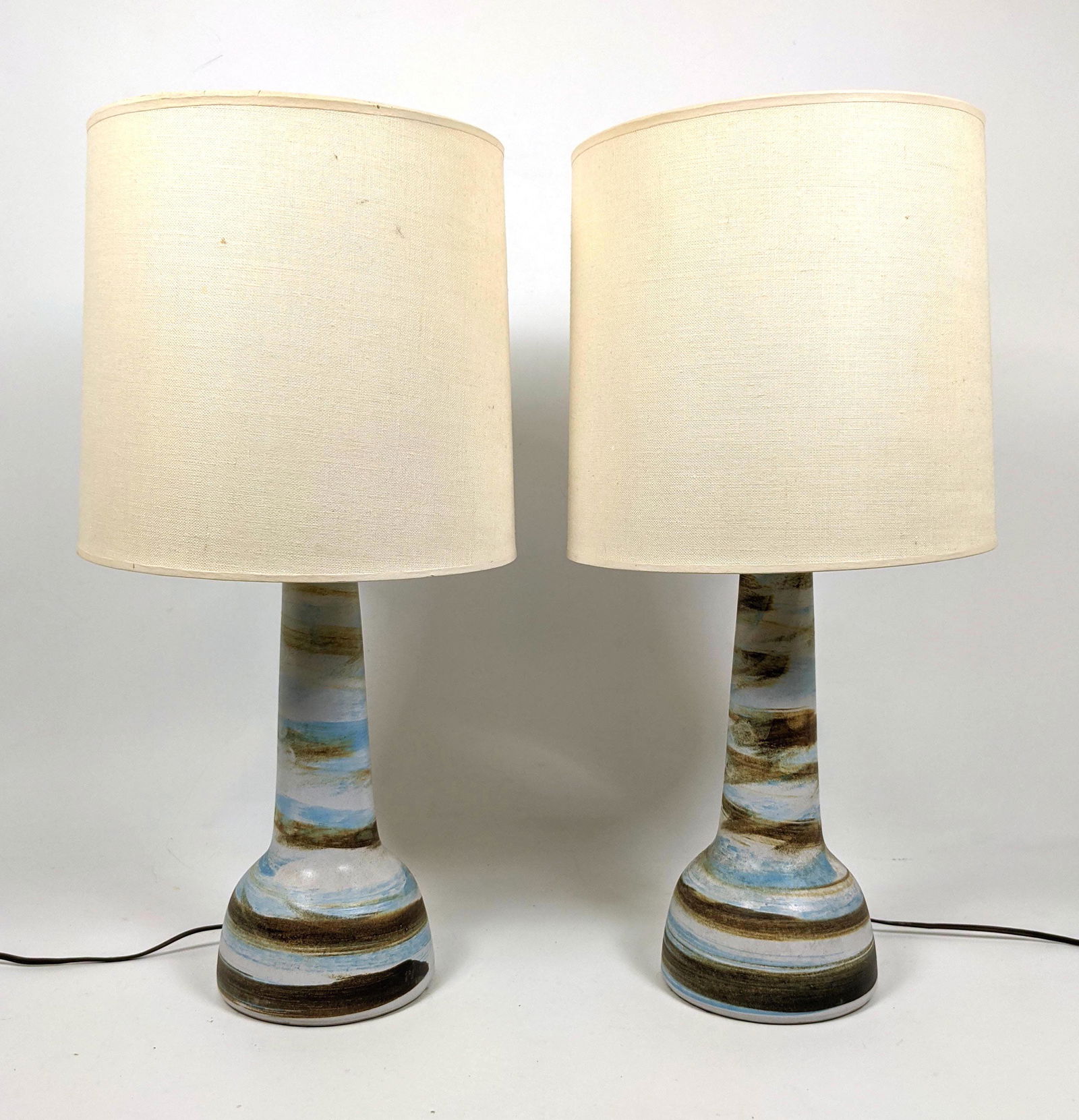 Pr MARTZ for MARSHALL STUDIOS Pottery Table Lamps. Blue: Pr MARTZ for MARSHALL STUDIOS Pottery Table Lamps. Blue and Brown Glaze Details. Signed. Original walnut finials. -- Dimensions: H: 23 inches: W: 10 inches: D: 10 inches ---