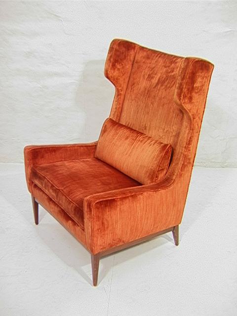GIO PONTI style Walnut Base Upholstered Wing Chai: GIO PONTI style Walnut Base Upholstered Wing Chair with angled arms. Unmarked. Dimensions: H: 45 inches: W: 32 inches: D: 32 inches Condition (General): Very Good Condition. Finish wear to legs. Pleas
