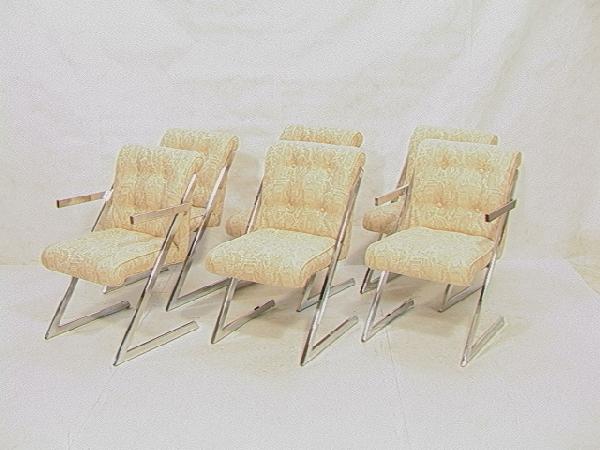 Set 6 DAVID HICKS Dining Chairs: 2 Arm and 4 Side: Set 6 DAVID HICKS Dining Chairs: 2 Arm and 4 Side Chairs. Angled flat chrome sides with upholstered body. Unmarked. 6 PCS. Dimensions: H: 34 inches: W: 21 inches: D: 23 inches Condition (General): Ver