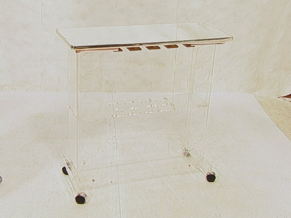 70's Modern Lucite Bar Serving Cart with Mirrored: 70's Modern Lucite Bar Serving Cart with Mirrored Top. Rolling. Dimensions: H: 33.25 inches: W: 34.25 inches: D: 14.5 inches Condition (General): Very Good Condition. Please contact us with specific q