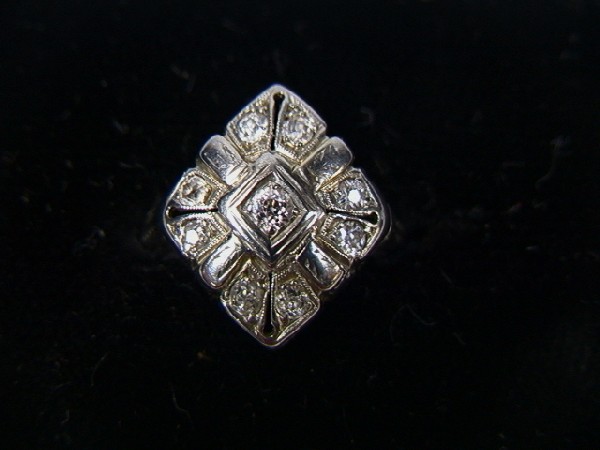 18K Gold and Diamond Ring. Art Deco white gold w: 18K Gold and Diamond Ring. Art Deco white gold with small diamonds. size 5-- Dimensions: --- Weight: 1.8 DWT --- Condition (General): Very Good Condition. Please contact us with specific questions abo