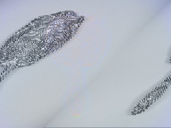 STERLING Art Nouveau Hand Mirror. Deep relief im: STERLING Art Nouveau Hand Mirror. Deep relief image of Art Nouveau Lady with Flowing Hair and Flowers. Mkd. (Silver weights are for weighable silver only. We did not count handles or weighted pieces i