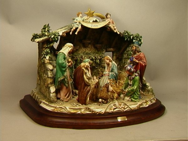 Large Cortese Signed Capodimonte Gloria Nativity : Large Cortese Signed Capodimonte Gloria Nativity Sculpture Porcelian. 470/119 -- Dimensions: H: 18 inches: W: 22 inches: D: 15 inches Condition (General): Very Good Condition. Minor loss to a leaf. Pl