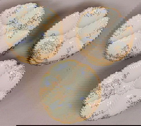 Set 12 Porcelain M. REDON LIMOGES Oyster Plates.: Set 12 Porcelain M. REDON LIMOGES Oyster Plates. A dozen Matching Plates with floral design and gold trim. Mkd-- Dimensions: H: 8.5 inches --- Condition (General): One with rim chip. Wear to gold pain