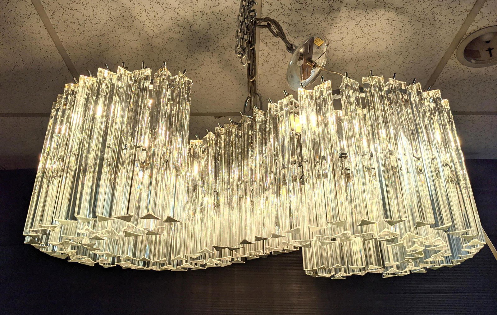Venini Style S shaped Chandelier Pendant Lamp. Possibly: Venini Style S shaped Chandelier Pendant Lamp. Possibly by Camer. Missing to crystal drops. -- Dimensions: H: 13 inches: W: 30 inches ---
