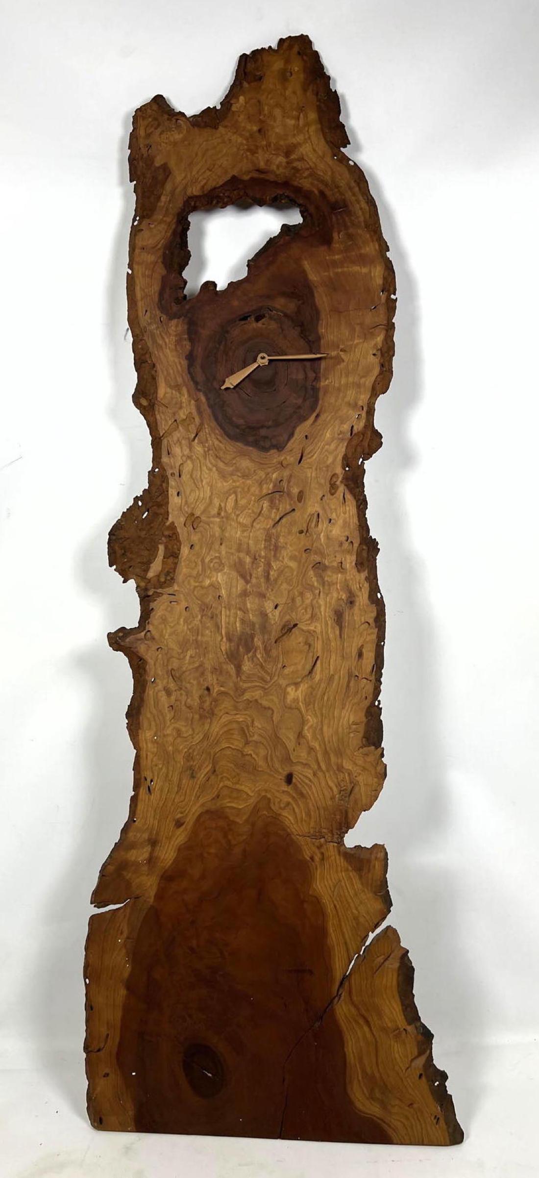 Thin Natural Form Wood Plank Wall Clock.: Thin Natural Form Wood Plank Wall Clock. -- Dimensions: H: 47 inches: W: 16 inches ---