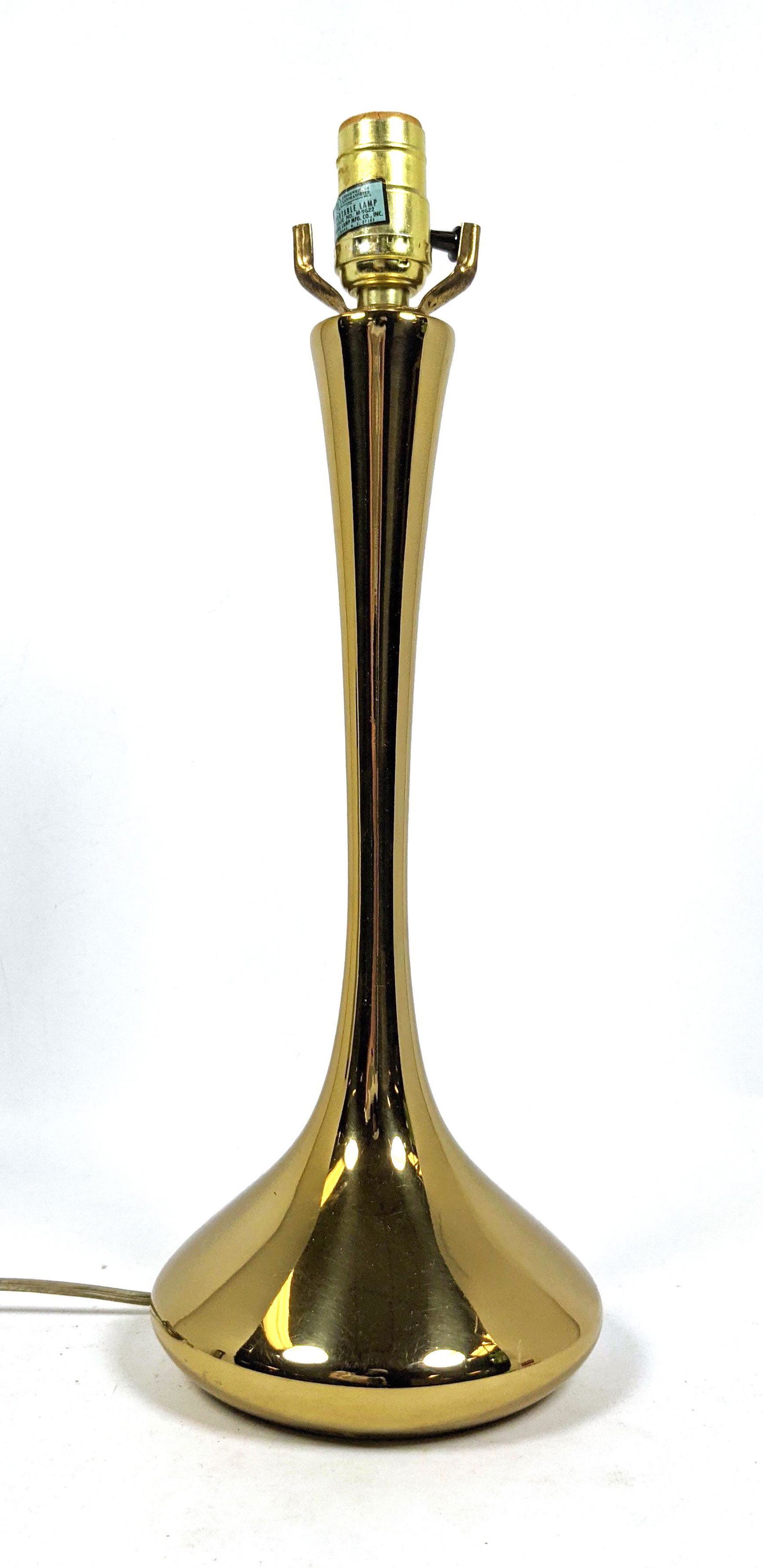 LAUREL Gold Tone Modernist Table Lamp. Label: LAUREL Gold Tone Modernist Table Lamp. Label-- Dimensions: H: 18 inches: W: 6.5 inches: D: 6.5 inches ---