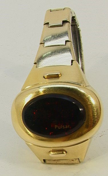Pulsar LED Red Face Ladies Watch. Space Age Design: Pulsar LED Red Face Ladies Watch. Space Age Design. 14K gold filled. Serial # 182386. Interior diameter 1.8in Dimensions: Condition: Lights up some surface scratching. US Shipping charge: 6