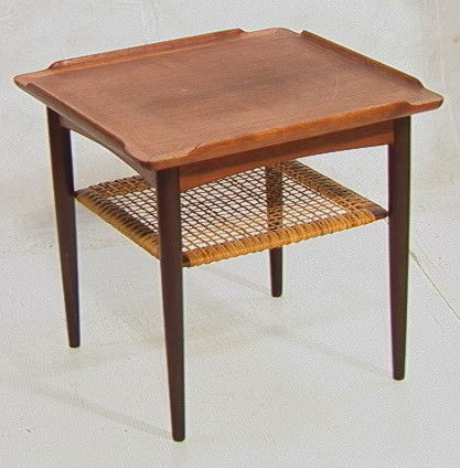 Selig Danish Modern Teak Occasional Side Table.: Selig Danish Modern Teak Occasional Side Table. Woven Lower Shelf. Metal Tag.-- Dimensions: H: 17.5 inches: W: 18.5 inches --- Condition (General): Some spots to top. Please contact us with specific q