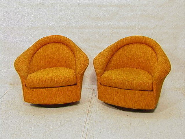 Pair Modernist Lounge Chairs. Diamond Arms. Bau: Pair Modernist Lounge Chairs. Diamond Arms. Baughman style. Swivel and rock. On round wood bases.-- Dimensions: H: 30 inches: W: 38 inches: D: 31 inches --- Condition (General): Few chips to wood base