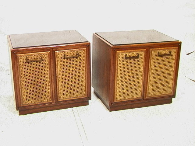 Pair American Modern Walnut Nightstands. Caned d: Pair American Modern Walnut Nightstands. Caned doors with black glass tops.-- Dimensions: H: 21.5 inches: W: 24 inches: D: 18 inches --- Condition (General): Very Good Condition. Please contact us wit