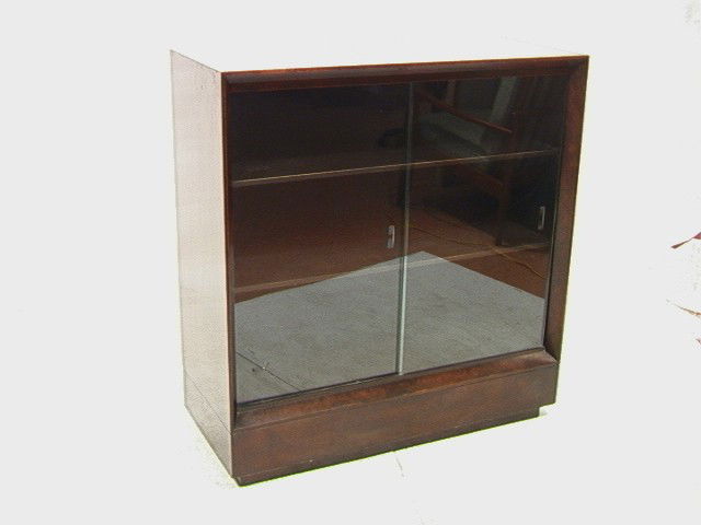 GILBERT ROHDE Herman Miller PALDAO Bookcase Cabin: GILBERT ROHDE Herman Miller PALDAO Bookcase Cabinet. Glass Sliding Doors. Herman Miller Paper Label.-- Dimensions: H: 42 inches: W: 40 inches: D: 17 inches --- Condition (General): Very Good Condition