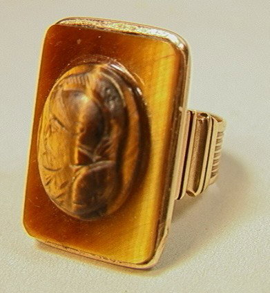 Antique Victorian Gold Tiger Eye Cameo Ring. Lar: Antique Victorian Gold Tiger Eye Cameo Ring. Large. Tested Gold. 6.1dwt. -- Dimensions: H: 1 inches: W: 0.5 inches--- Weight: 6.1 DWT --- Condition (General): Very Good Condition. Please contact us wi
