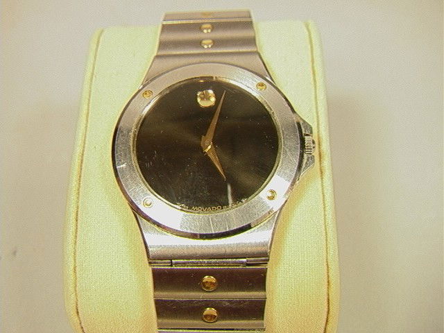 Movado Stainless Steel Watch.: Movado Stainless Steel Watch.-- Dimensions: --- Please contact us with specific questions about condition, not visible in the photos. --- US Shipping charge: $7